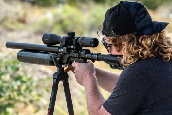 Competitive shooter aiming air rifle at target-Ultimate Idaho Airgunners Cup 2025